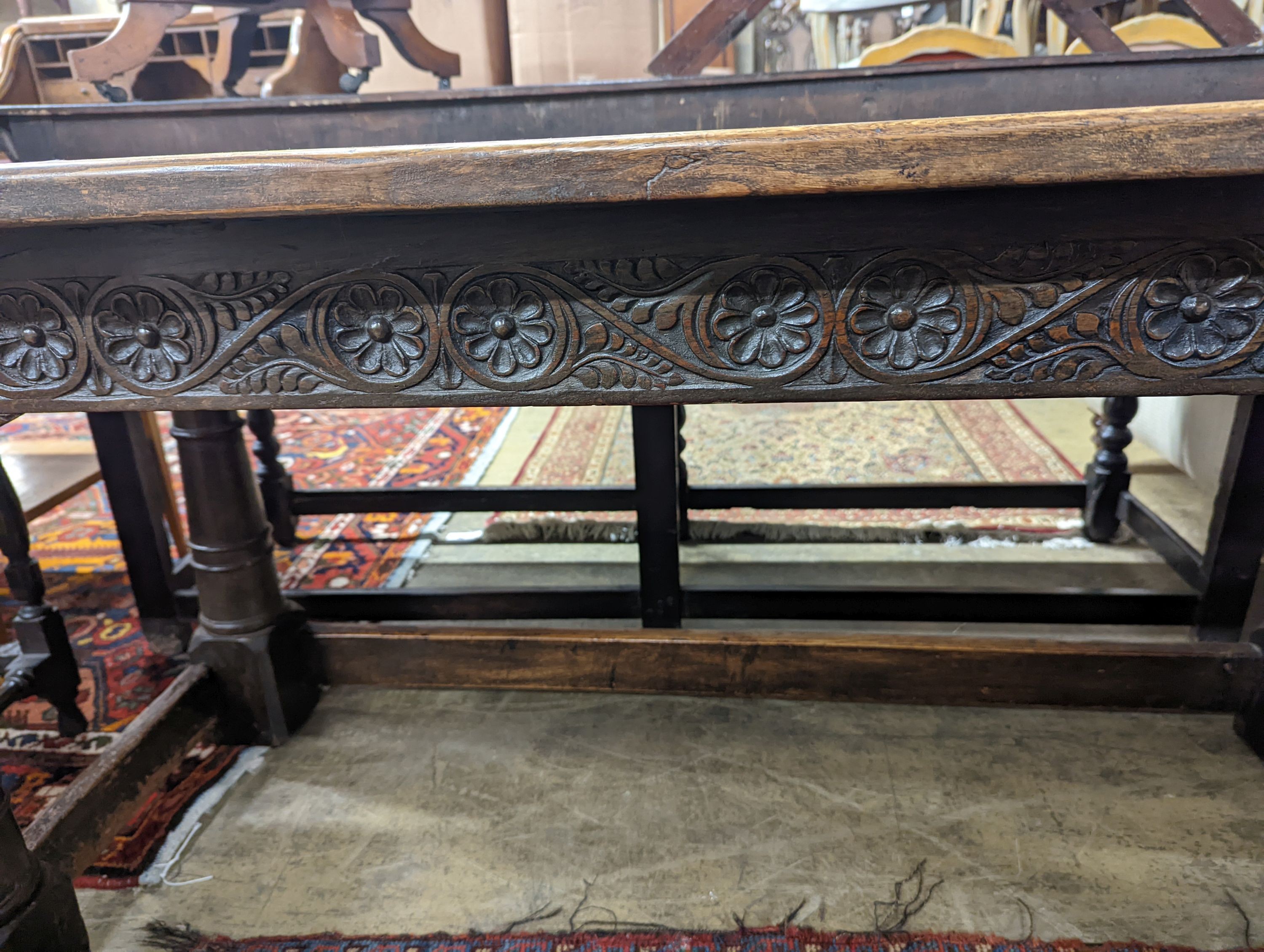A 17th century rectangular oak refectory dining table, length 167cm, depth 74cm, height 76cm